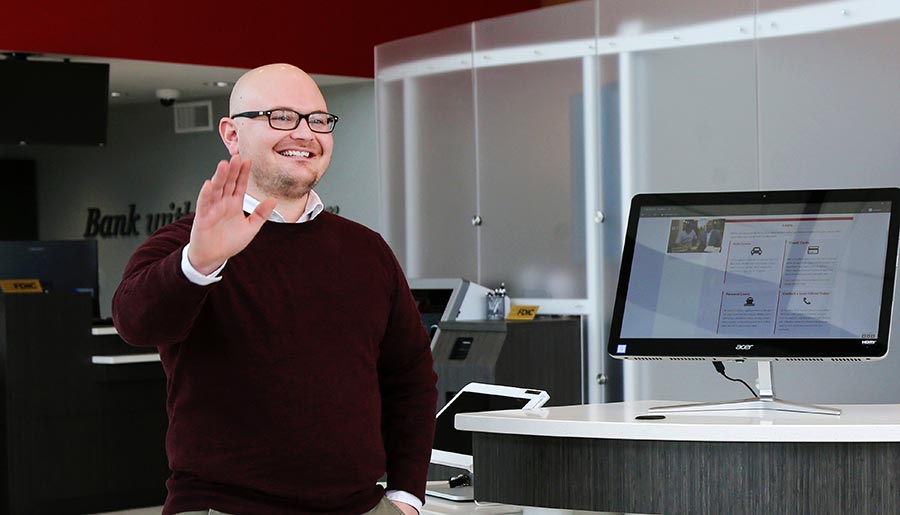 First Metro Bank Employee Welcoming Visitors